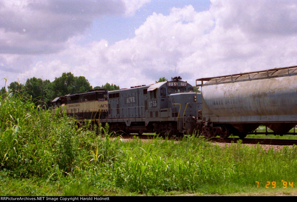 ACWR 1755 & 3802 shoving a train thru town